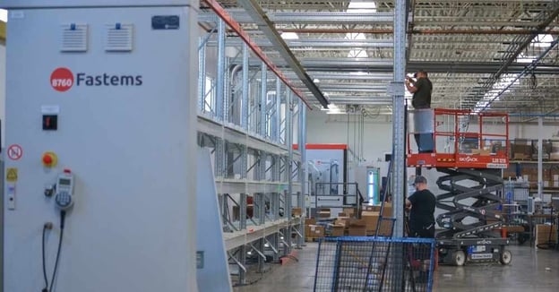 Maintenance technicians assemble expanded Fastems system