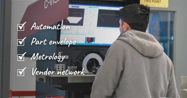 Machinist inspects part on an optical comparator