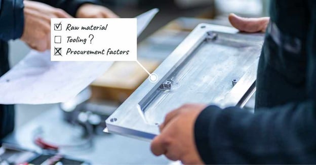 Engineer examines machined component