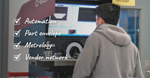 Machinist inspects part on an optical comparator