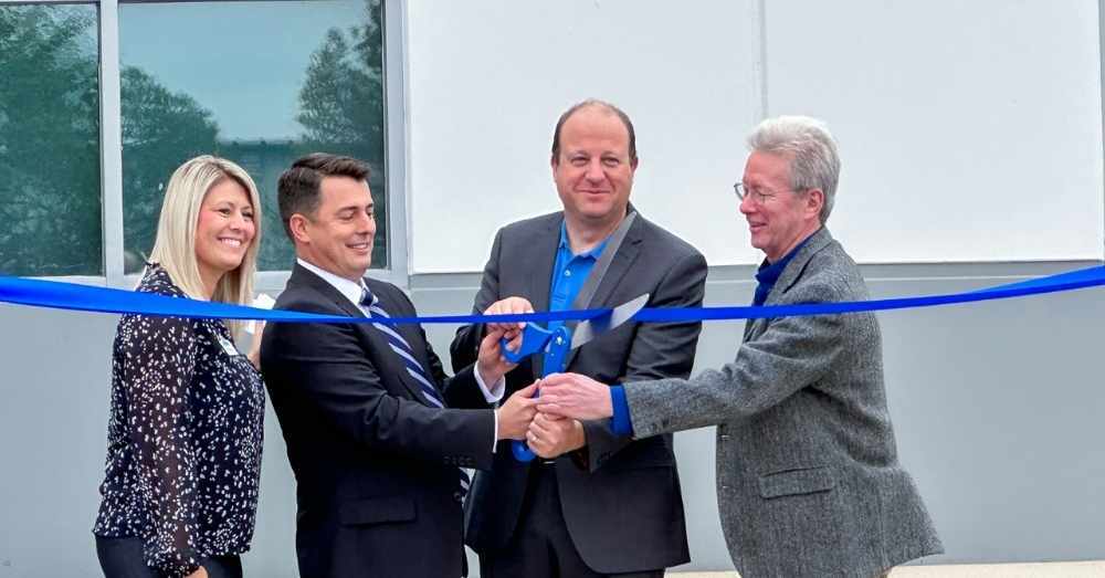 Hirsh founder and President cut ribbon at grand opening ceremony
