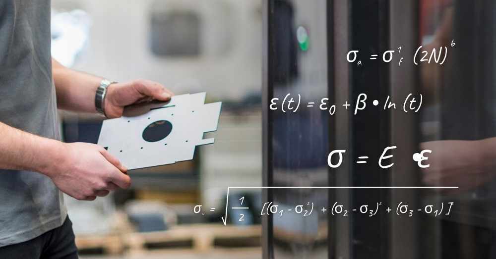 Engineer visually inspects a part for flatness