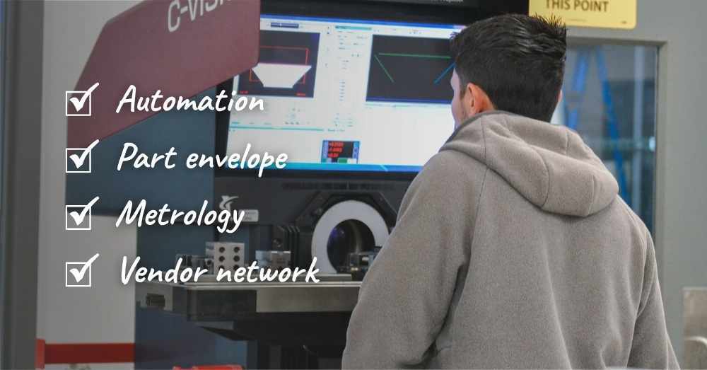 Machinist inspects part on an optical comparator