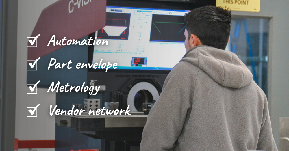 Machinist inspects part on an optical comparator
