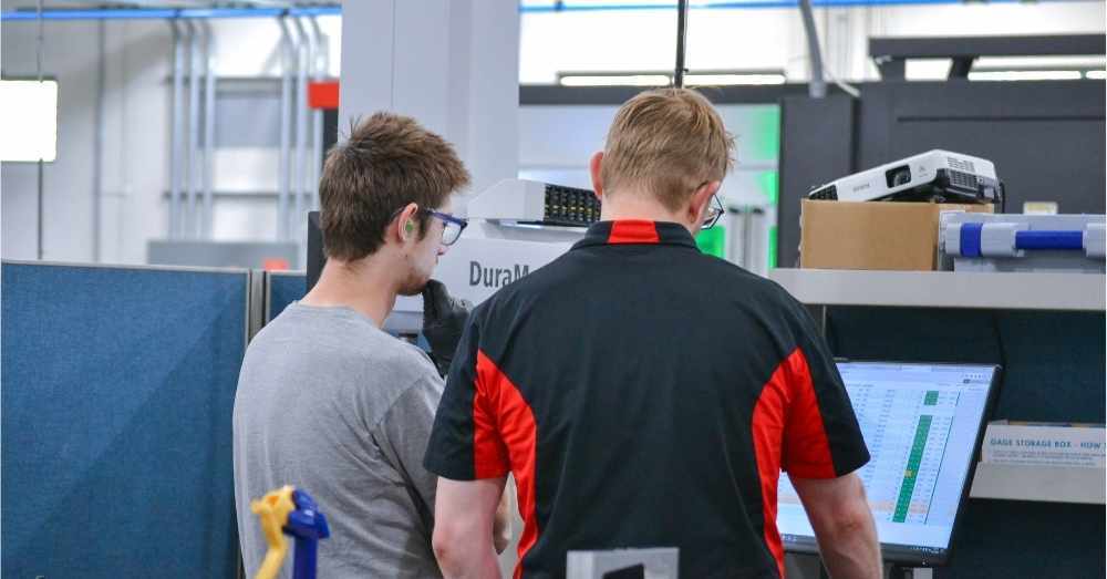 Quality engineer cross trains CNC machinist on CMM 